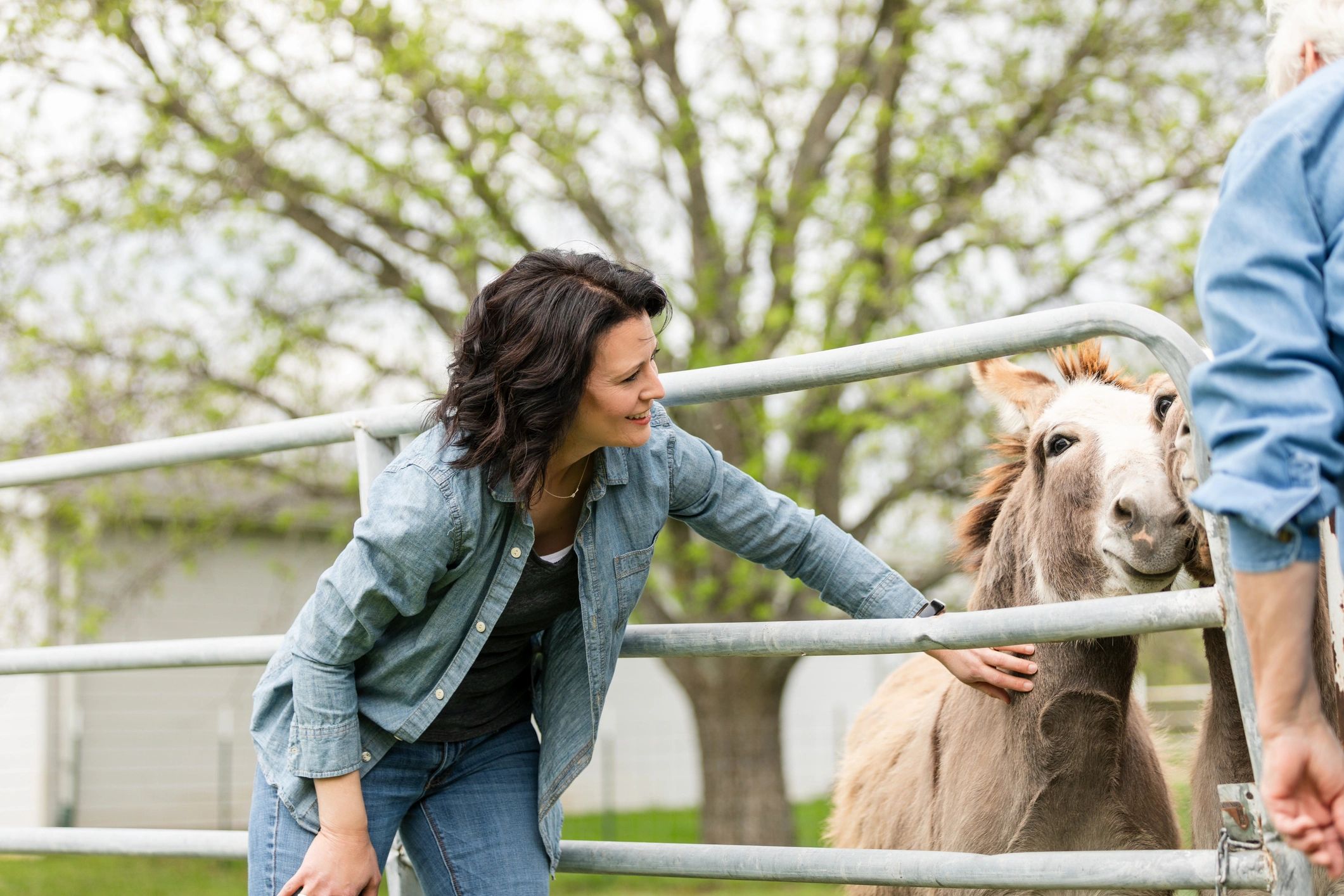 Woman smiling in a farm setting